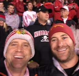 Eric Clarke and Michael Wilson were still just football buddies at this MSU-Cornhuskers game in 2015 but now game stakes are about to go much higher.