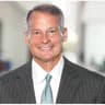A buoyant Schwab CEO Walter Bettinger declares 'darkest' days past for Schwab as in-house RIA asset quarterly inflows surge 60%, but analyst's 'free-cash' question raises his ire