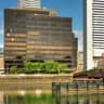 Fidelity Investments may finally throttle down its 'crazy,' two-year-plus hiring binge in August after it added a 'Schwabitrade' worth of staff and grew to 42 million plan participants -- more than Canada's population!