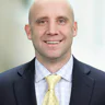 Eric Clarke makes seven big Orion hires that reflect the big check it wrote to Bain & Co. -- including a 'poach' from his brother, Todd