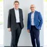 Scott Hanson and Pat McClain throw off 'death grip' of 'cognitive dissonance' by stepping down from co-CEO positions, which one attests could 'suck the life' from him