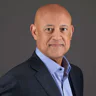 Bill Crager buys Wall Street patience by detailing how Envestnet can rent out brainpower, deliver 'wellness' and be rewarded with revenues at an astounding 40 basis points higher