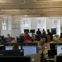 Call-center associates and engineers sit side by side at Future Advisor's gritty San Francisco digs.