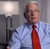 Charles 'Chuck' Schwab seems to be betting that Merrill Lynch won't try 'accountability' in its line-blurring ads