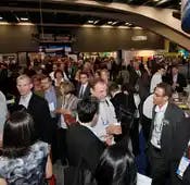 The 325-plus exhibiting firms connected with a sea of humanity in IMPACT's 2011 expo